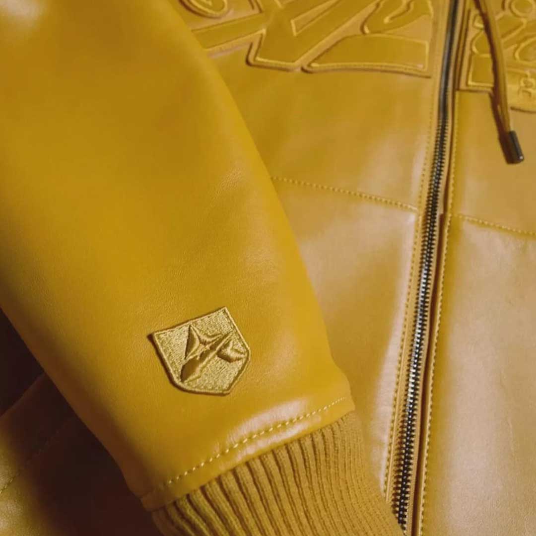 Close Up of Attached Hood Adjustable Drawstrings and Ribbed Cuffs on Avirex Yellow Jacket by Jackets Kingdom