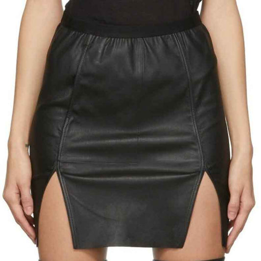 Women's black leather mini skirt with side slit featured in a leather skirt buying guide