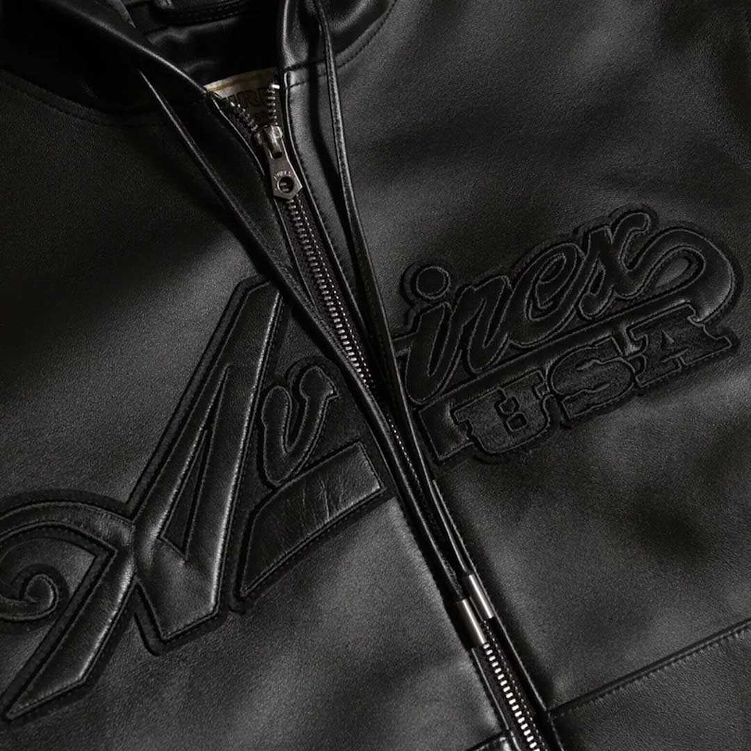 Close up Avirex embroidered chest applique on black leather hoodie by Jackets Kingdom
