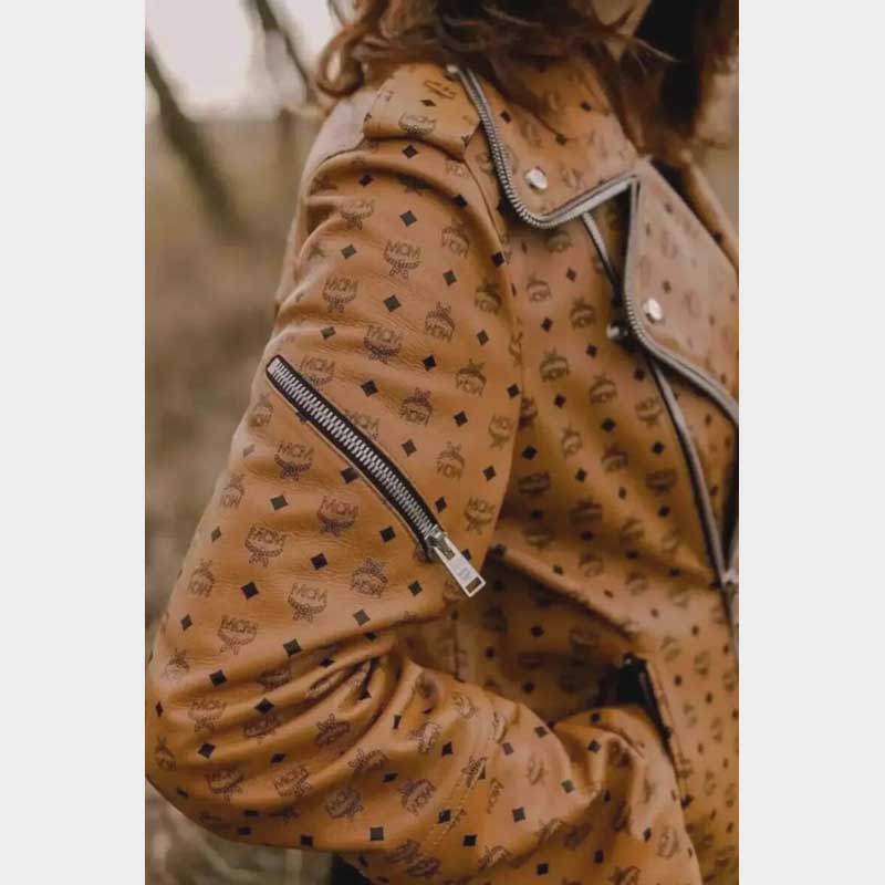 Close up of premium cowhide leather texture on women's MCM biker jacket by Jackets Kingdom