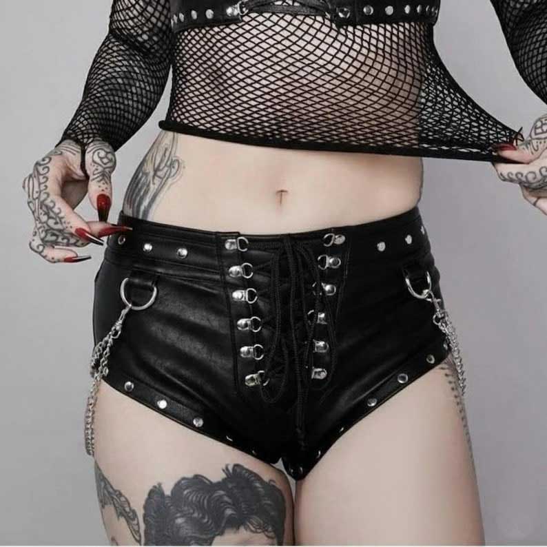 High waisted black gothic shorts featuring metal studs and removable chain accents by Jackets Kingdom