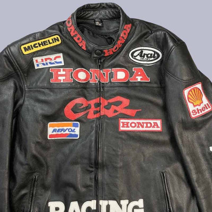 Close up of Honda CBR embroidered racing patches on black leather jacket