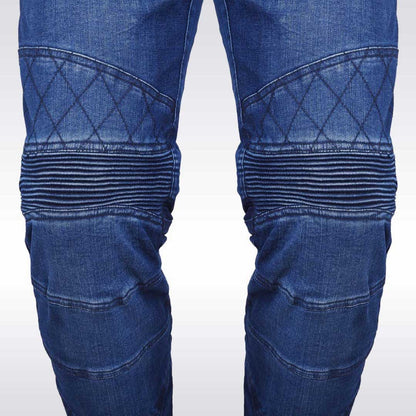 Close-up of blue jeans with quilted design