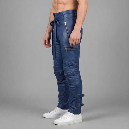 Men's blue cowhide leather cargo pants showing high waist construction and reinforced knee panels