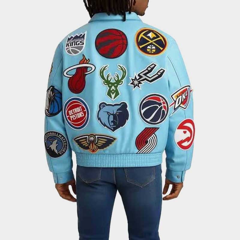 Person wearing NBA Team Logo Patch Varsity Leather Jacket Lakers Bulls Knicks Warriors with ribbed cuffs and waistband
