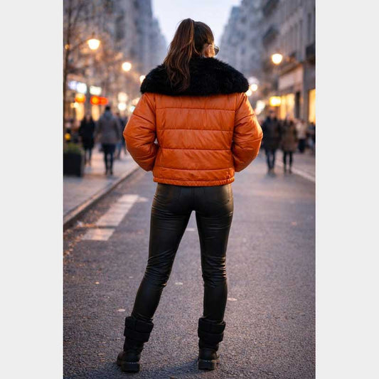 Vibrant orange winter coat featuring luxury faux fur trim and full front zipper closure
