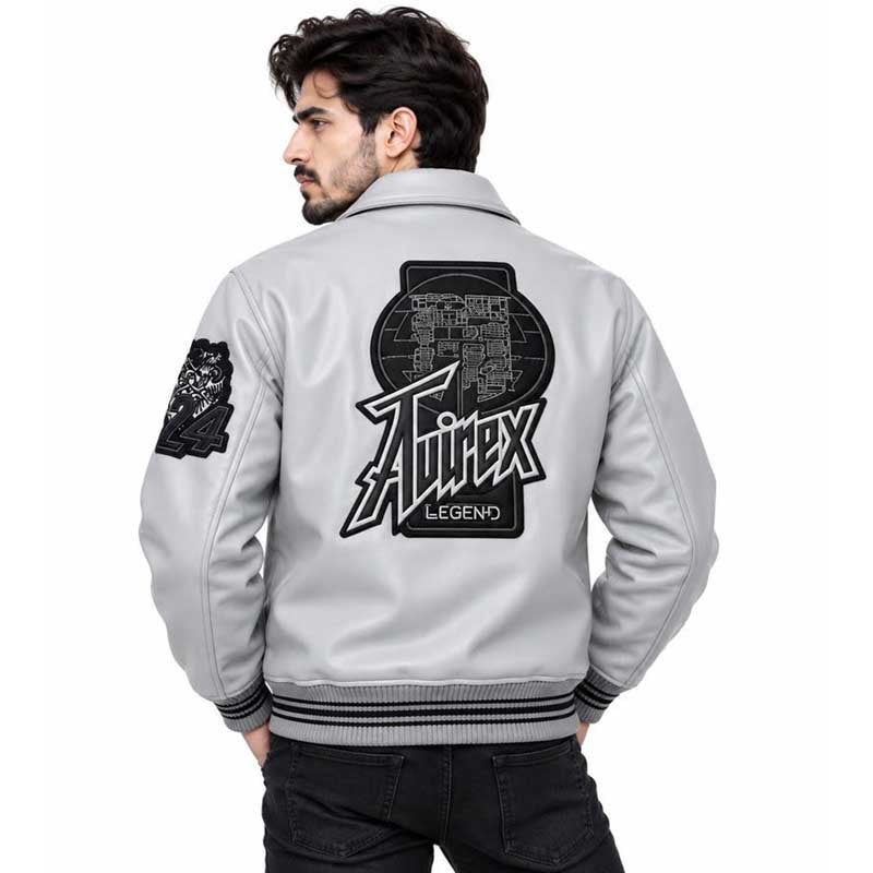 Grey leather varsity jacket featuring a classic snap-button closure