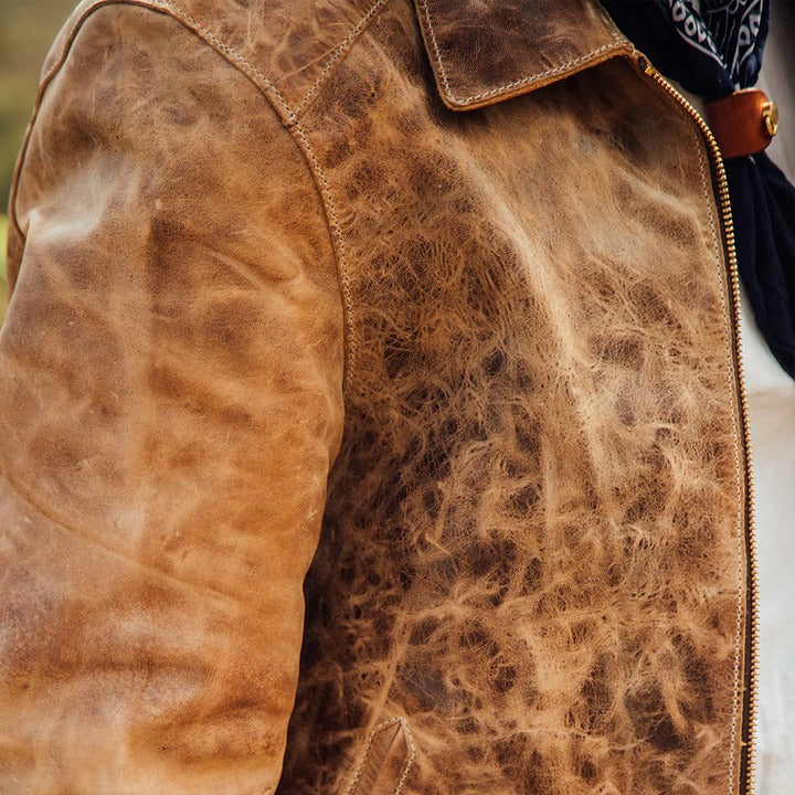 Men's two pocket leather coat in brown with exceptional craftsmanship and serial number authentication