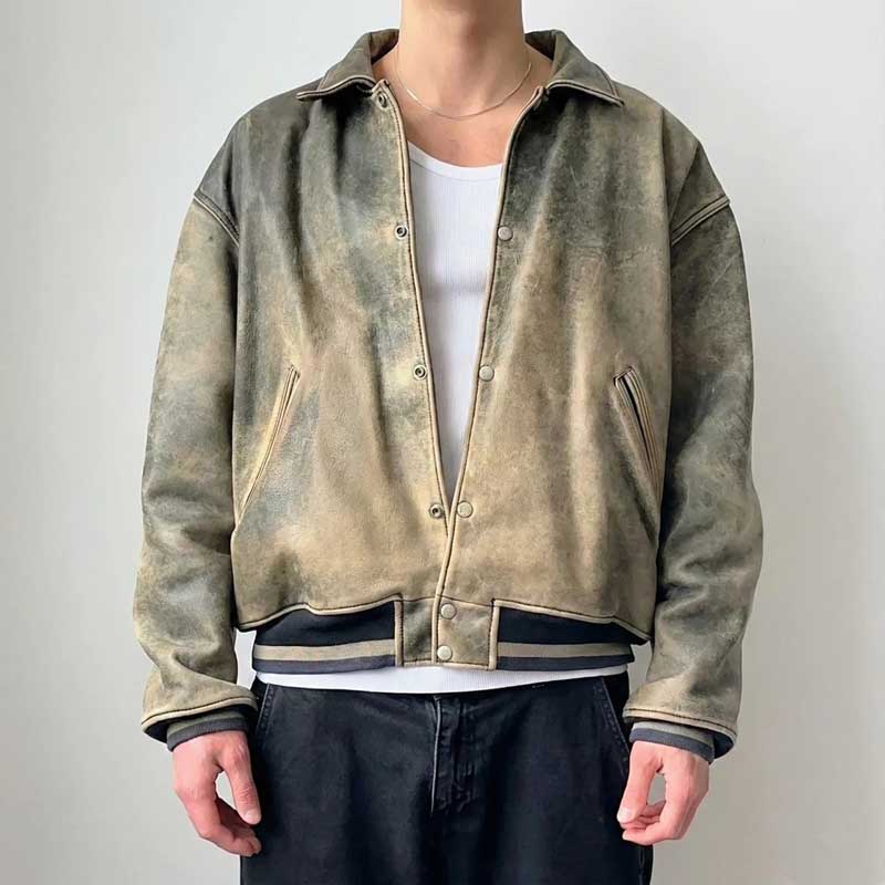 Classic boxy vintage bomber jacket with distressed finish and contrasting ribbed hem and cuffs