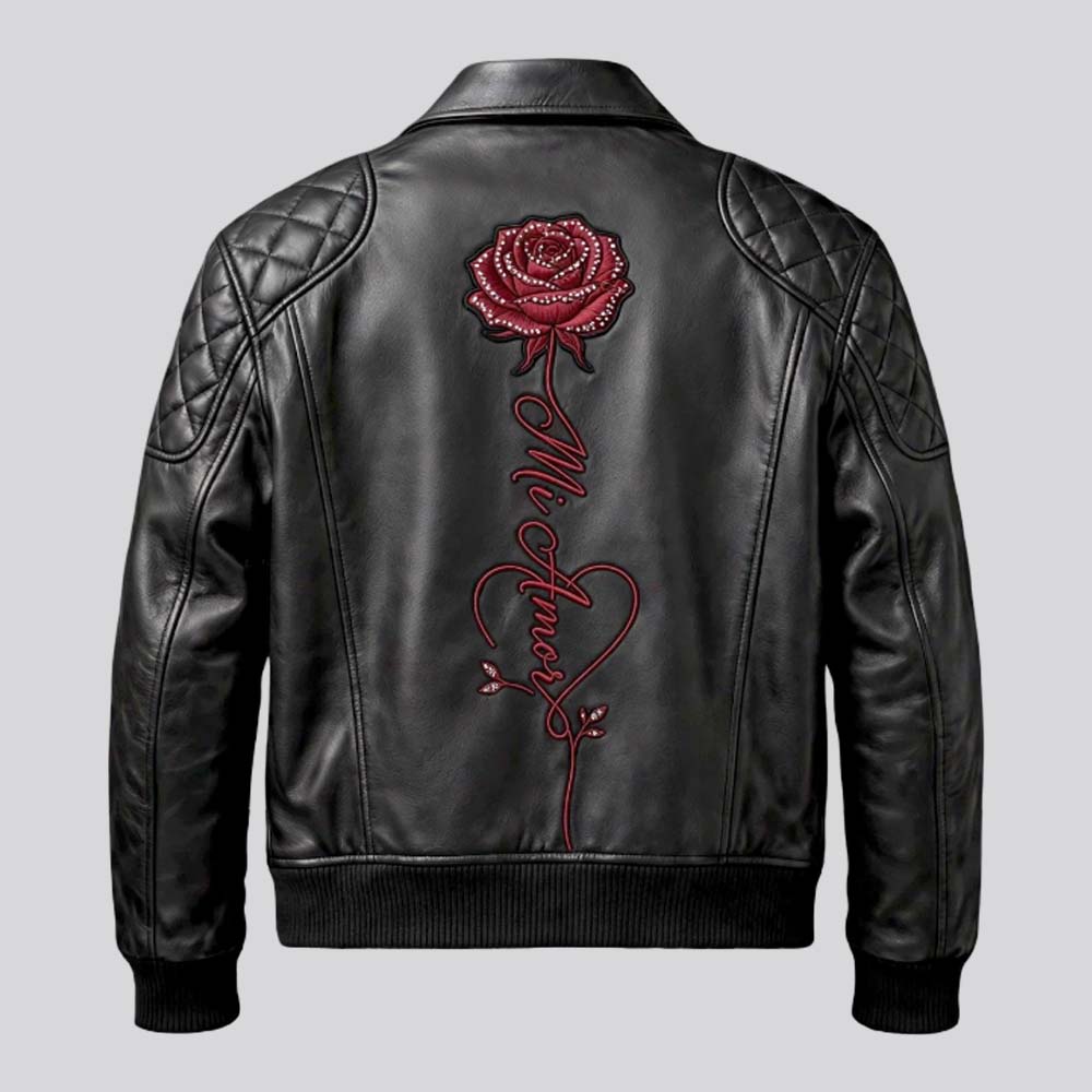 Black Mi Amor leather jacket featuring floral lettering embroidery and quilted shoulders