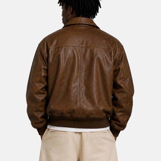 Vintage leather bomber with front zipper and flap pockets