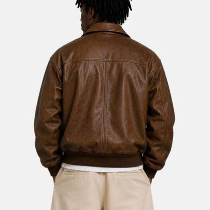Vintage leather bomber with front zipper and flap pockets