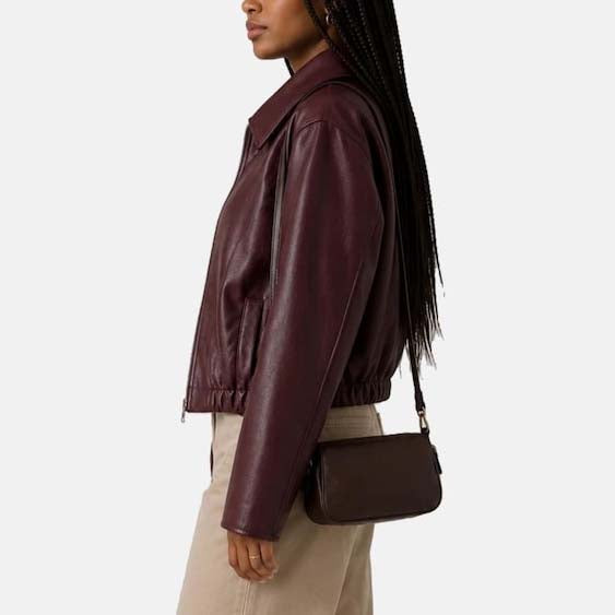 Women’s vintage-inspired burgundy leather jacket with shirt collar